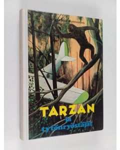 Kirjailijan Edgar Rice Burroughs käytetty kirja Tarzan ja tytönryöstäjät
