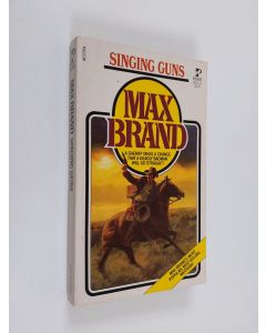 Kirjailijan Max Brand käytetty kirja Singing Guns