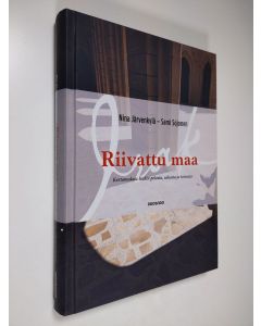 Kirjailijan Nina Järvenkylä käytetty kirja Riivattu maa : kertomuksia Irakin pelosta, toivosta ja uskosta