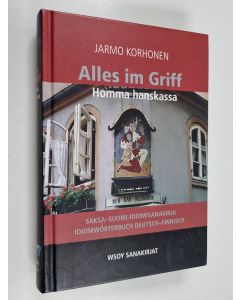 Kirjailijan Jarmo Korhonen käytetty kirja Alles im Griff = Homma hanskassa : saksa-suomi-idiomisanakirja = Idiomwörterbuch Deutsch-Finnisch