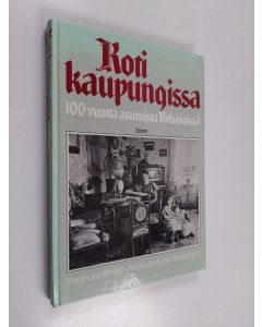 Kirjailijan Marja-Liisa Rönkkö käytetty kirja Koti kaupungissa : 100 vuotta asumista Helsingissä