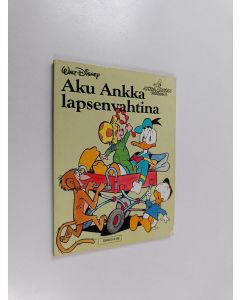 Kirjailijan Walt Disney käytetty kirja Aku Ankka lapsenvahtina