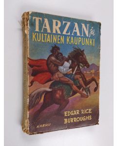 Kirjailijan Edgar Rice Burroughs käytetty kirja Tarzan ja kultainen kaupunki : apinain Tarzanin uusia seikkailuja kultaisessa kaupungissa