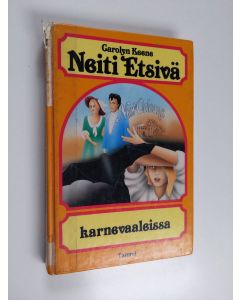 Kirjailijan Carolyn Keene käytetty kirja Neiti Etsivä karnevaaleissa