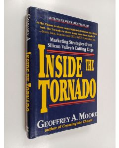 Kirjailijan Geoffrey A. Moore käytetty kirja Inside the tornado : marketing strategies from Silicon Valley's cutting edge