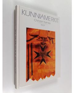 Kirjailijan Christer Karnila käytetty kirja Kunniamerkit