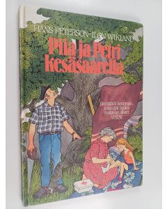 Kirjailijan Hans Peterson käytetty kirja Piia ja Petri kesäsaarella