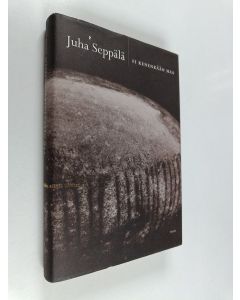 Kirjailijan Juha Seppälä käytetty kirja Ei kenenkään maa