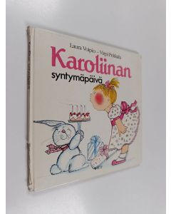 Kirjailijan Laura Voipio käytetty kirja Karoliinan syntymäpäivä