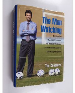 Kirjailijan Tim Crothers käytetty kirja The Man Watching - A Biography of Anson Dorrance, the Unlikely Architect of the Greatest College Sports Dynasty Ever