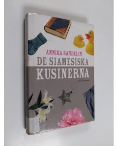 Kirjailijan Annika Sandelin käytetty kirja De siamesiska kusinerna