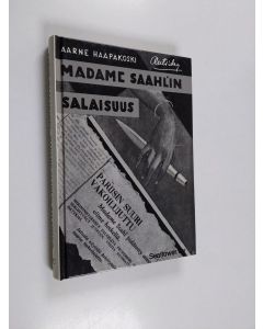 Kirjailijan Aarne Haapakoski käytetty kirja Madame Saahl'in salaisuus : kertomus suuresta vakoilusyndikaatista