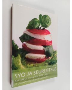 Kirjailijan Niklas Bengtsson käytetty kirja Syö ja seurustele : keittokirjabibliografia 1990-2003 ja gastronomista kaunokirjallisuutta