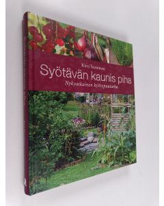 Kirjailijan Kirsi Tuominen käytetty kirja Syötävän kaunis piha