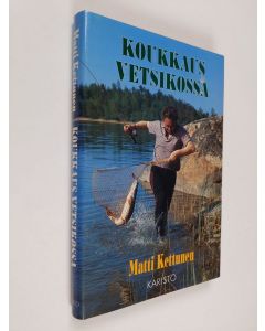 Kirjailijan Matti Kettunen käytetty kirja Koukkaus Vetsikossa ja muita kertomuksia kalavesiltä ja erämetsistä (ERINOMAINEN)