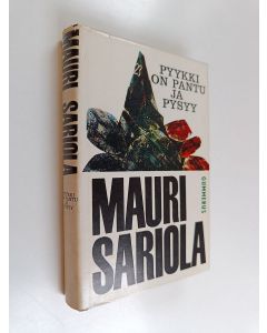 Kirjailijan Mauri Sariola käytetty kirja Pyykki on pantu ja pysyy