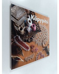 Kirjailijan Janette Baker käytetty kirja Käpypitsi