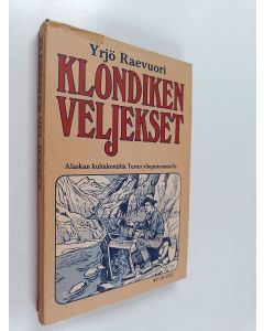 Kirjailijan Yrjö Raevuori käytetty kirja Klondiken veljekset : Alaskan kultakentiltä Turun Yliopistonmäelle