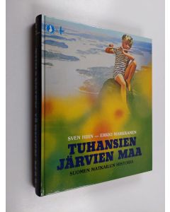 Kirjailijan Sven Hirn & Erkki Markkanen käytetty kirja Tuhansien järvien maa : Suomen matkailun historia