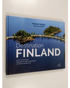 Kirjailijan Hannu Vallas käytetty kirja Destination Finland : aerial landscapes = aèrofotosnimki pejzažej = maisemat ilmakuvina