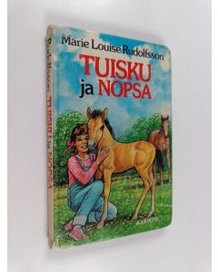 Kirjailijan Marie Louise Rudolfsson käytetty kirja Tuisku ja Nopsa