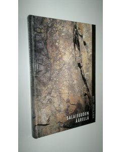 Kirjailijan Matti Järveläinen käytetty kirja Salaisuuden äärellä