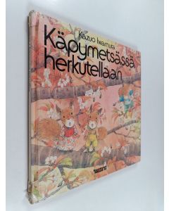 Kirjailijan Kazuo Iwamura käytetty kirja Käpymetsässä herkutellaan
