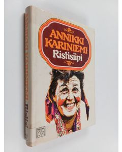 Kirjailijan Annikki Kariniemi käytetty kirja Ristisiipi : muistelmia ja mietteitä