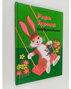 Kirjailijan Pirkko Koskimies käytetty kirja Pupu Tupuna leikkipuistossa