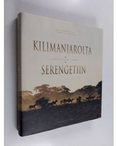 Kirjailijan Olli Marttila käytetty kirja Kilimanjarolta Serengetiin : Afrikan suuri luonto