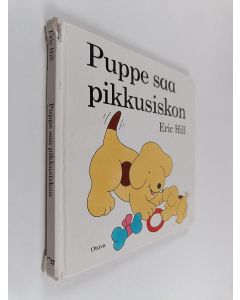 Kirjailijan Eric Hill käytetty kirja Puppe saa pikkusiskon