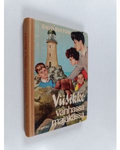 Kirjailijan Enid Blyton käytetty kirja Viisikko vanhassa majakassa