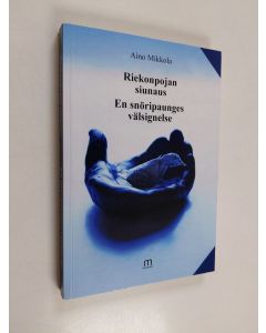 Kirjailijan Aino Mikkola käytetty kirja Riekonpojan siunaus = En snöripaunges välsignelse