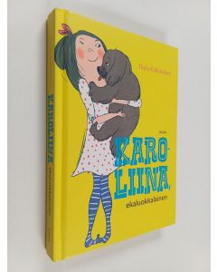 Kirjailijan Tuula Kallioniemi käytetty kirja Karoliina, ekaluokkalainen : Karoliina ja Baskeri-Villen koira ; Karoliina ja vallaton pentu (yhteisnide)