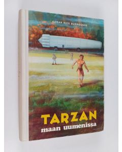 Kirjailijan Edgar Rice Burroughs käytetty kirja Tarzan maan uumenissa