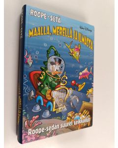 Kirjailijan Walt Disney käytetty kirja Maalla, merellä ja ilmassa