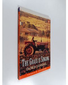 Kirjailijan Doris Lessing käytetty kirja The grass is singing : Penguin readers