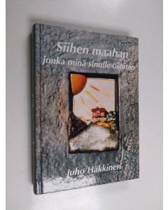 Kirjailijan Juho Häkkinen käytetty kirja Siihen maahan jonka minä sinulle osoitan