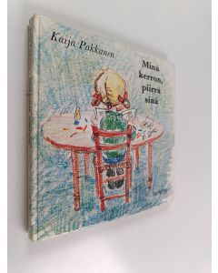Kirjailijan Kaija Pakkanen käytetty kirja Minä kerron, piirrä sinä