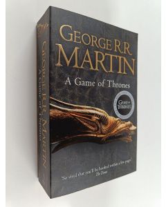 Kirjailijan George R. R. Martin käytetty kirja A Game of Thrones