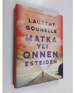 Kirjailijan Laurent Gounelle käytetty kirja Matka yli onnen esteiden