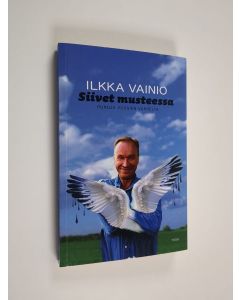 Kirjailijan Ilkka Vainio käytetty kirja Siivet musteessa : runoja vuosien varrelta