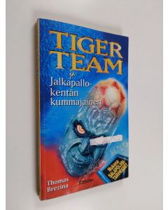 Kirjailijan Thomas Brezina käytetty kirja Tiger Team ja jalkapallokentän kummajainen