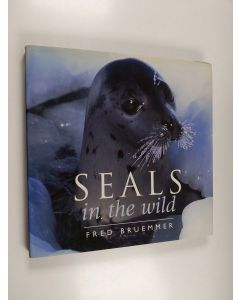 Kirjailijan Fred Bruemmer käytetty kirja Seals in the Wild