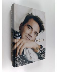 Kirjailijan Chris Heath käytetty kirja Iholla : Robbie Williams