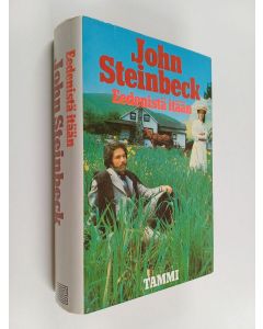 Kirjailijan John Steinbeck käytetty kirja Eedenistä itään