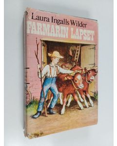 Kirjailijan Laura Ingalls Wilder käytetty kirja Farmarin lapset