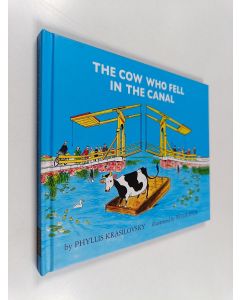 Kirjailijan Peter Spier & Phyllis Krasilovsky käytetty kirja The Cow Who Fell in the Canal