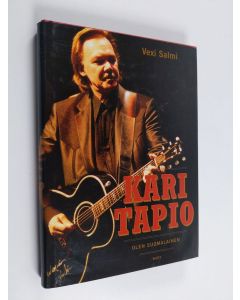 Kirjailijan Vexi Salmi käytetty kirja Kari Tapio : olen suomalainen