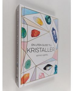 Kirjailijan Astrid Carvel käytetty kirja En liten guide till kristaller
